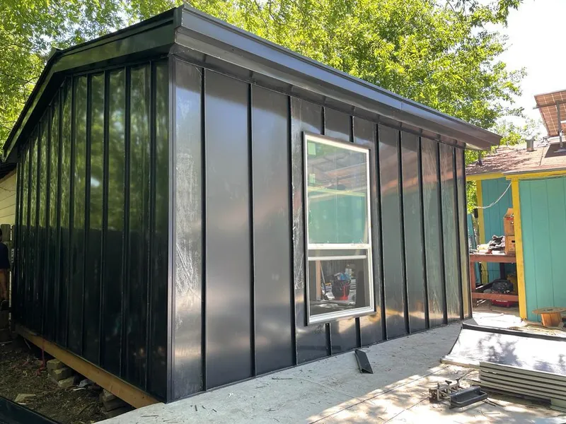 Black standing seam metal wall panels for Roof Inspection in Monroeville